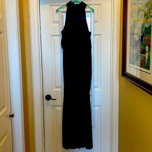 Long emerald green velvet sleeveless dress